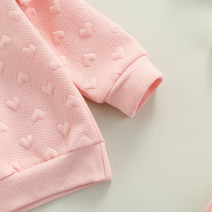 Dress your little one in cozy cuteness with this pink Newborn Girls Autumn Long Sleeve Heart Printed Sweatsuit. Made from a soft, breathable cotton-polyester blend