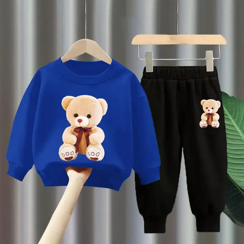 Get your little one ready for the colder months with our Winter Girls Cartoon Bear Printed Sweatshirt & Pants set!