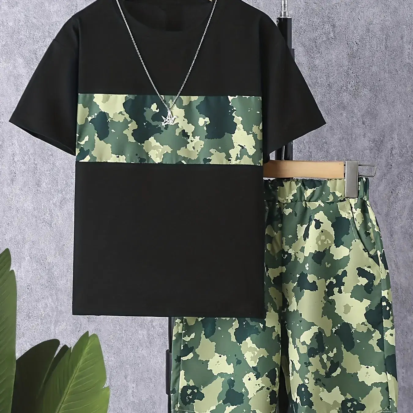 This summer, dress your little boy in the stylish and comfortable Camouflage Round Neck T-shirt and Shorts set!