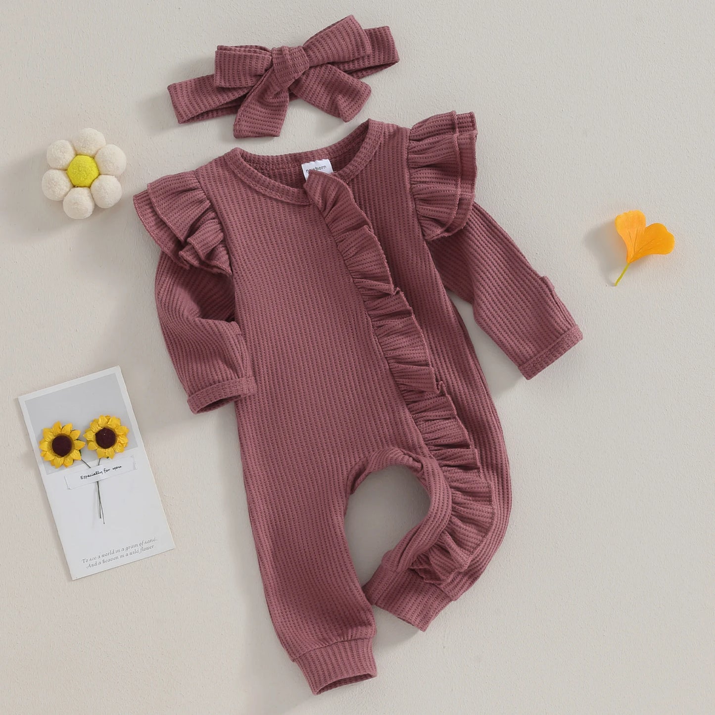 Welcome your little one into the world with this adorable Newborn Knitted Fly Long Sleeve Romper-Headband!