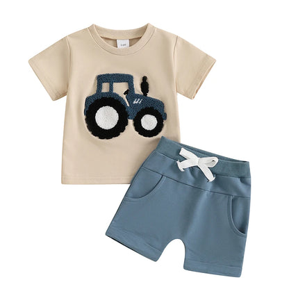 The Summer Toddler Boys Embroidered T-Shirt and Elastic Waist Shorts set is perfect for your little one's summer adventures.