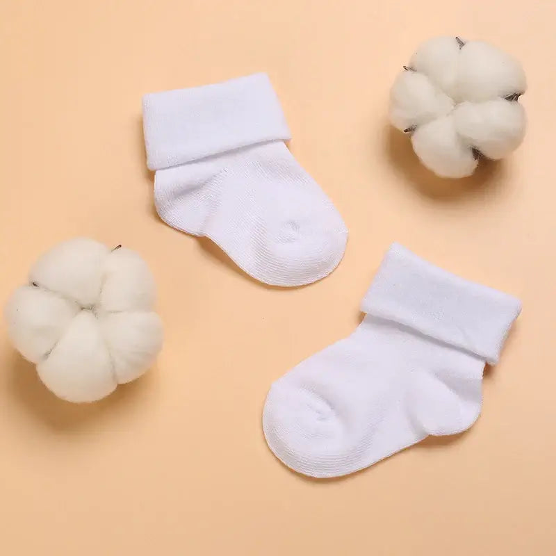 Wrap your little one's feet in comfort and cuteness with our Newborn White Lovely Cotton Baptism Socks!