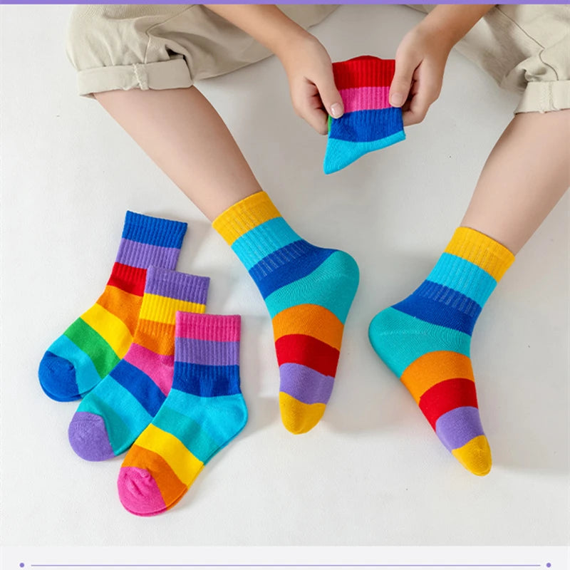 Introduce your little ones to colorful fun with our Kids Fun Rainbow 7 Color Stripes Tube Socks 5PK!