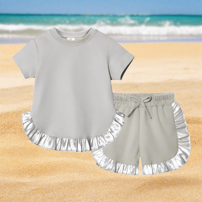 Elevate her summer with our Toddler Girls' Ruffled Top-Shorts set. Perfect for any occasion, crafted for comfort and style. 