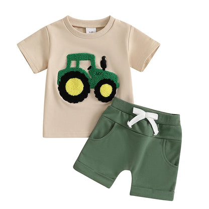 The Summer Toddler Boys Embroidered T-Shirt and Elastic Waist Shorts set is perfect for your little one's summer adventures.