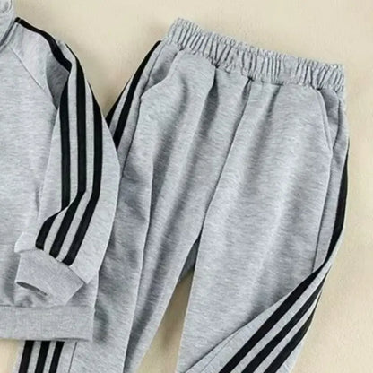 Get your little champ ready for action with this Boys Autumn Striped Sport Jacket and Matching Pants!