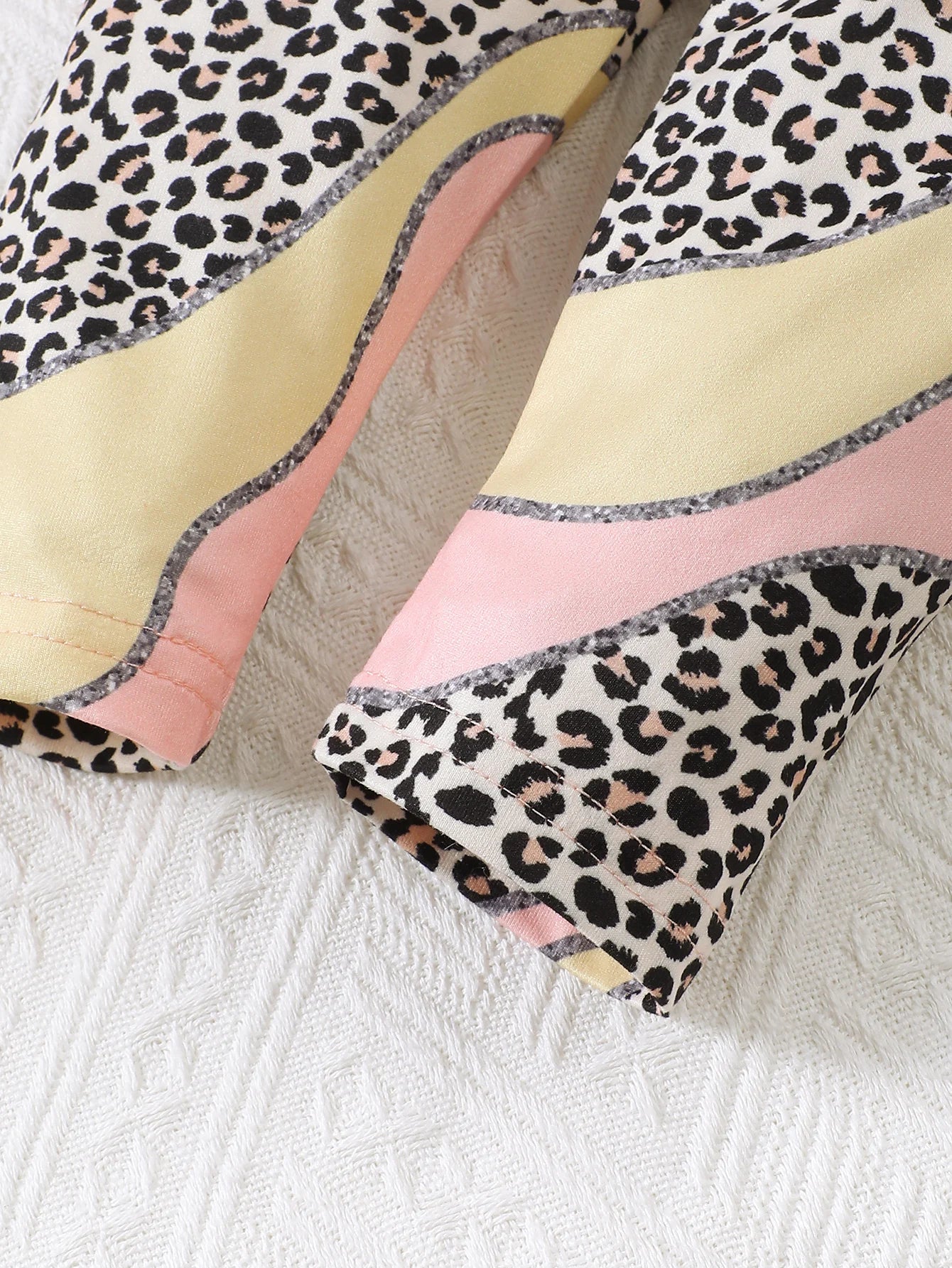 Get your little roarer ready with this Toddler Girls Autumn Sleeveless Top Multicolor Pants featuring a sleeveless leopard-print top and multicolor pants.