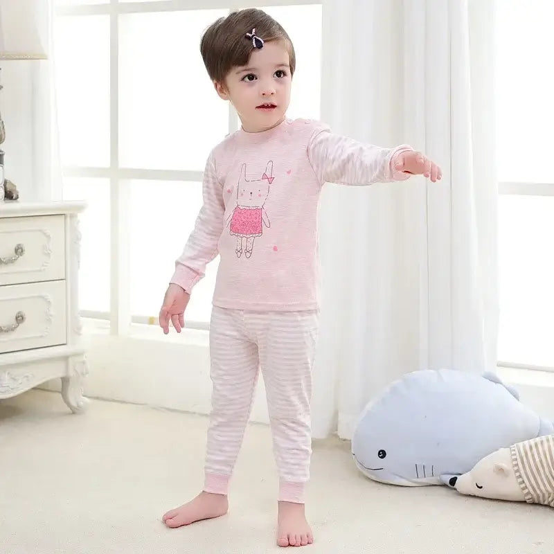 Keep your little one cozy and cute with this Toddler Kids Long Sleeve Cartoon Sleepwear 2PC Set. Made from soft cotton, these pajamas fit true to size