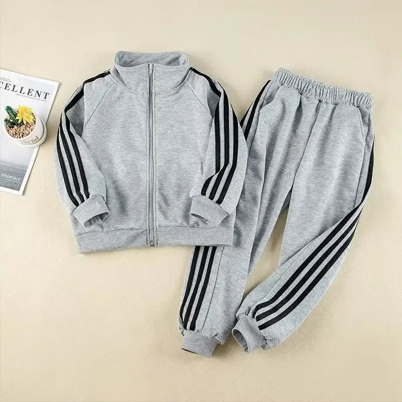 Get your little champ ready for action with this Boys Autumn Striped Sport Jacket and Matching Pants!