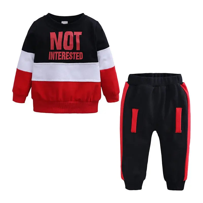 Introducing our Autumn Toddler Boys NOT INTERESTED Tracksuit, perfect for your little one's active days.