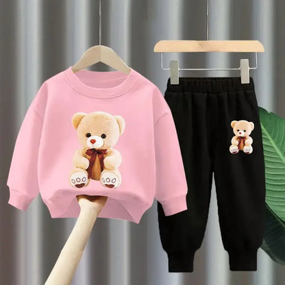 Get your little one ready for the colder months with our Winter Girls Cartoon Bear Printed Sweatshirt & Pants set!