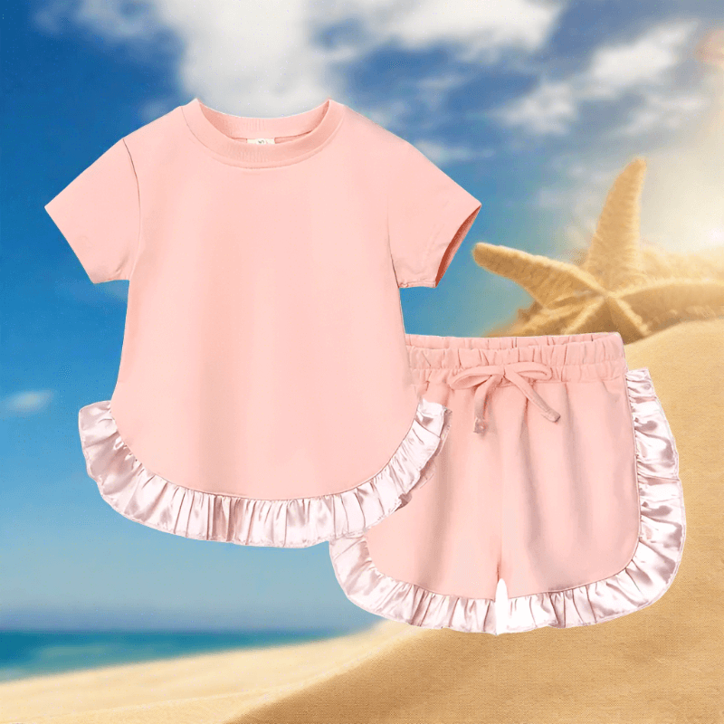 Elevate her summer with our Toddler Girls' Ruffled Top-Shorts set. Perfect for any occasion, crafted for comfort and style. 