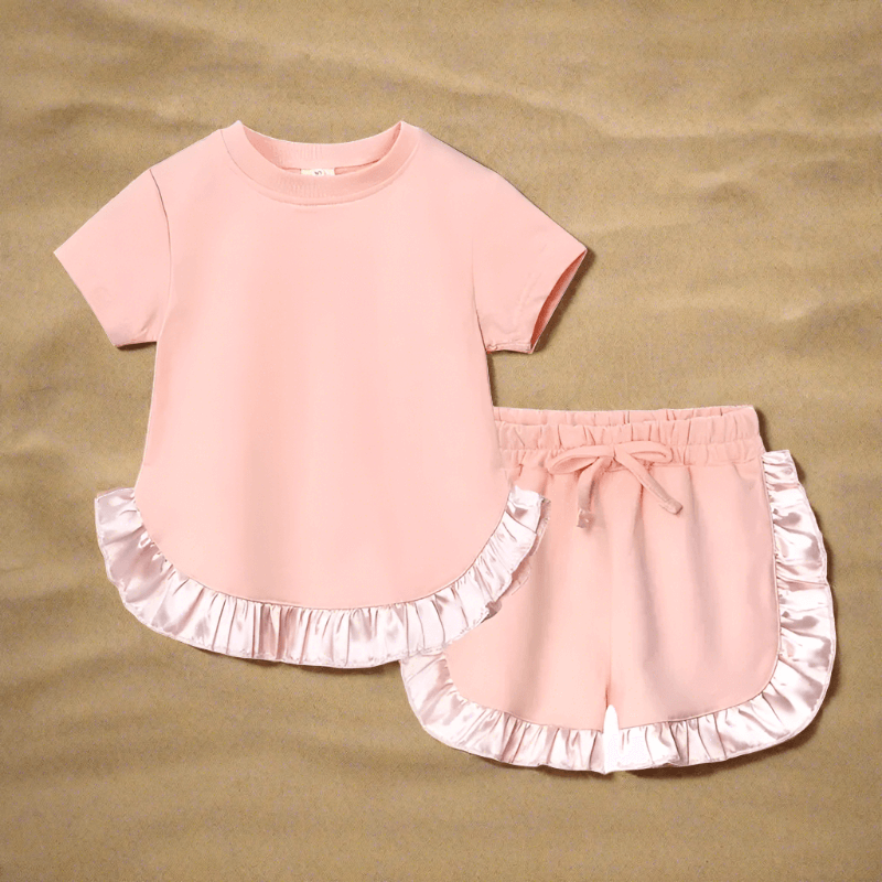 Elevate her summer with our Toddler Girls' Ruffled Top-Shorts set. Perfect for any occasion, crafted for comfort and style. 