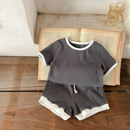 Get ready for warmer weather with these Summer Infant Boys Short Sleeve Striped Tops and Shorts!