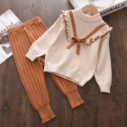Keep your little one cozy and stylish this autumn and winter with this sweet Toddler Girls Autumn Fashion Long Sleeve Sweater Pants Set. 