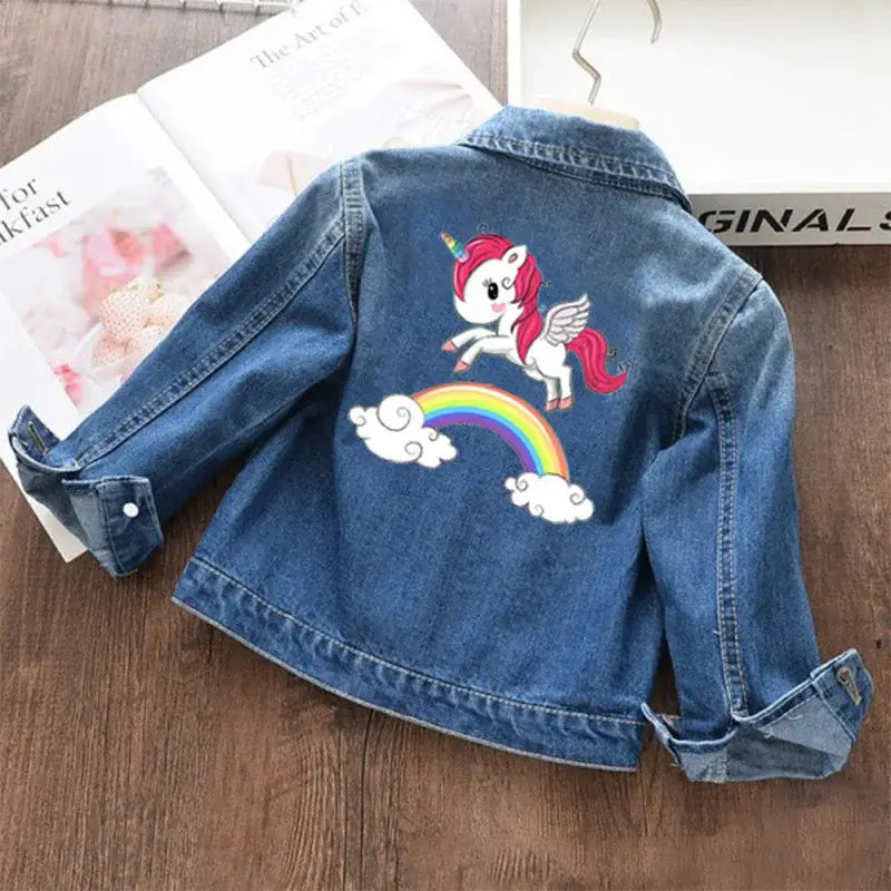 Sprinkle some magic into your child's wardrobe with our Girls Fashion Cartoon Unicorn Denim Jacket.