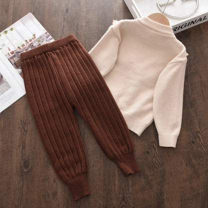 Keep your little one cozy and stylish this autumn and winter with this sweet Toddler Girls Autumn Fashion Long Sleeve Sweater Pants Set. 