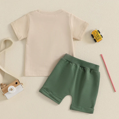 The Summer Toddler Boys Embroidered T-Shirt and Elastic Waist Shorts set is perfect for your little one's summer adventures.