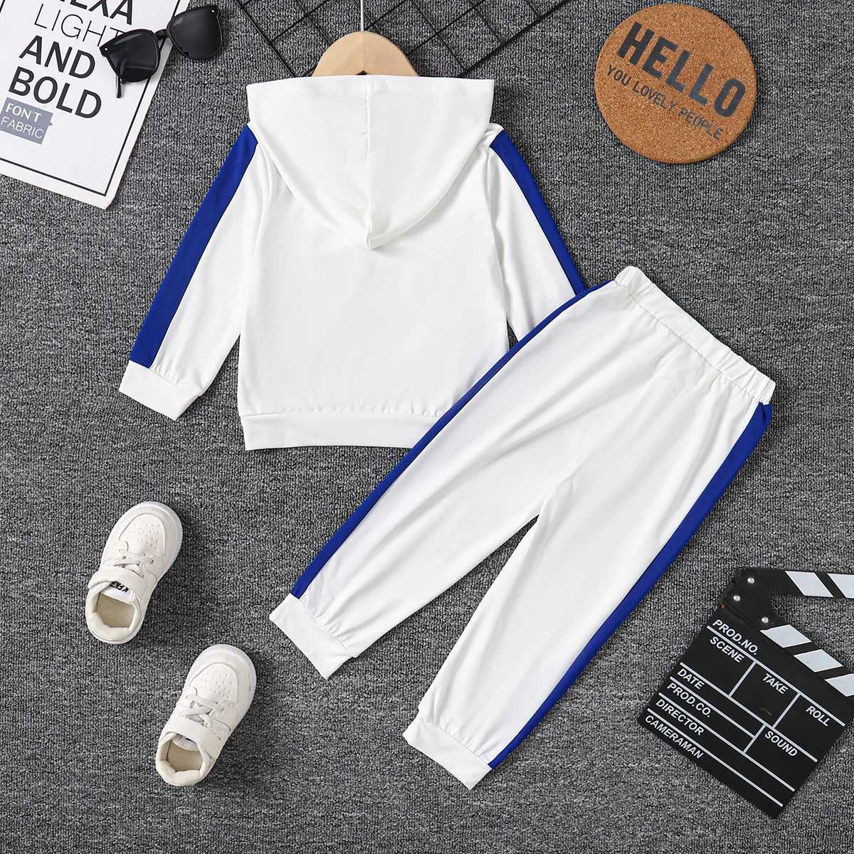 This playful Toddler Boys Letter Patchwork Hoodie Sweater with Pants is perfect for boys aged 18 months to 6 years.