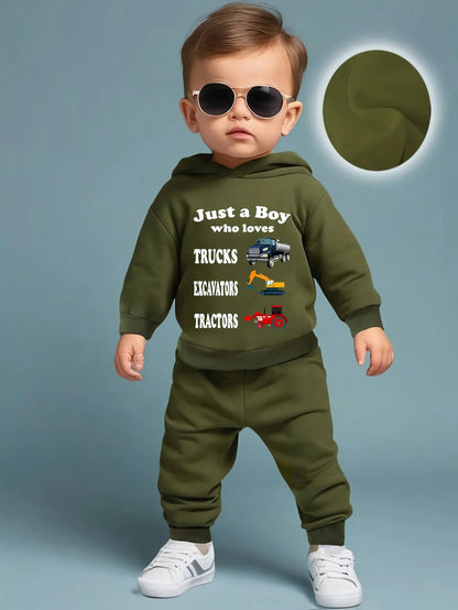 Your little man will love snuggling into this adorable Toddler Boys JUST A BOY Printed Fleece Sweatsuit—think of it as wearable comfort.