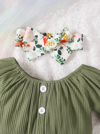 Get your little girl ready for summer with this playful set! Featuring a short-sleeved top, headscarf, and floral bow shorts.