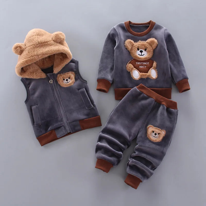 Keep your little one cozy and giggle-ready this winter with our adorable three-piece Toddler Kids Winter Fleece Cartoon Hooded Vest-Coat-Pants! 