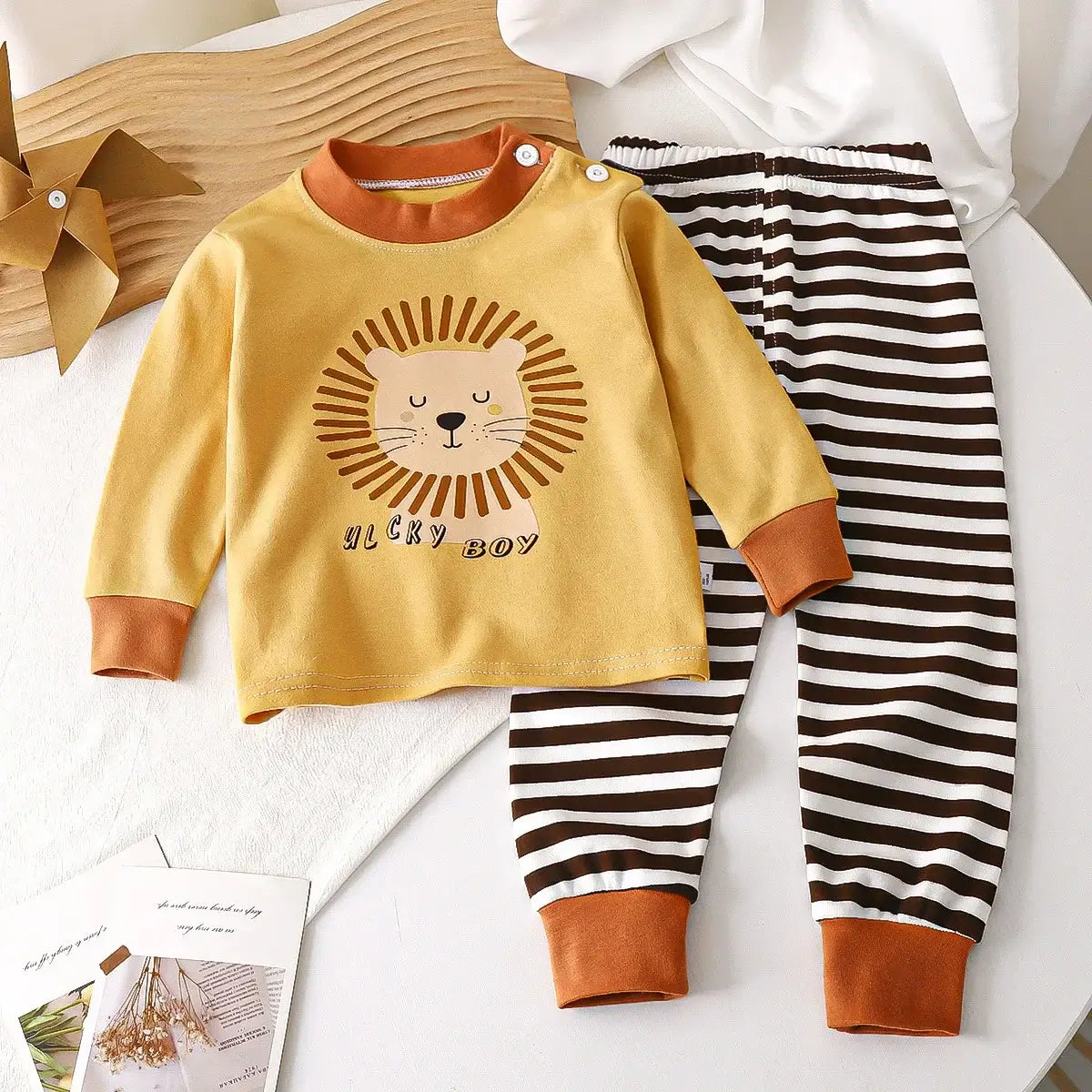 Keep your little one cozy and cute in this Autumn Toddlers Long Sleeve 2PC Pajama Set. Made from soft combed cotton, this Autumn Toddlers Long Sleeve 2PC Pajama Set is breathable enough to keep skin happy and irritation-free—because cranky jammies are no