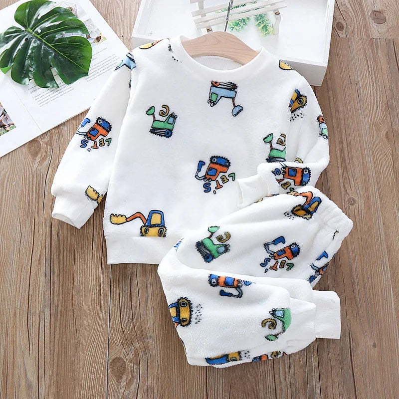 Keep your little one cozy and cute with these Toddler Boys Winter Flannel Cartoon Pattern Pajamas! Designed with a fun cartoon pattern.
