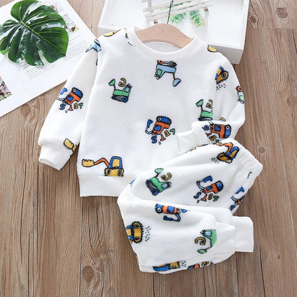 Keep your little one cozy and cute with these Toddler Boys Winter Flannel Cartoon Pattern Pajamas! Designed with a fun cartoon pattern.