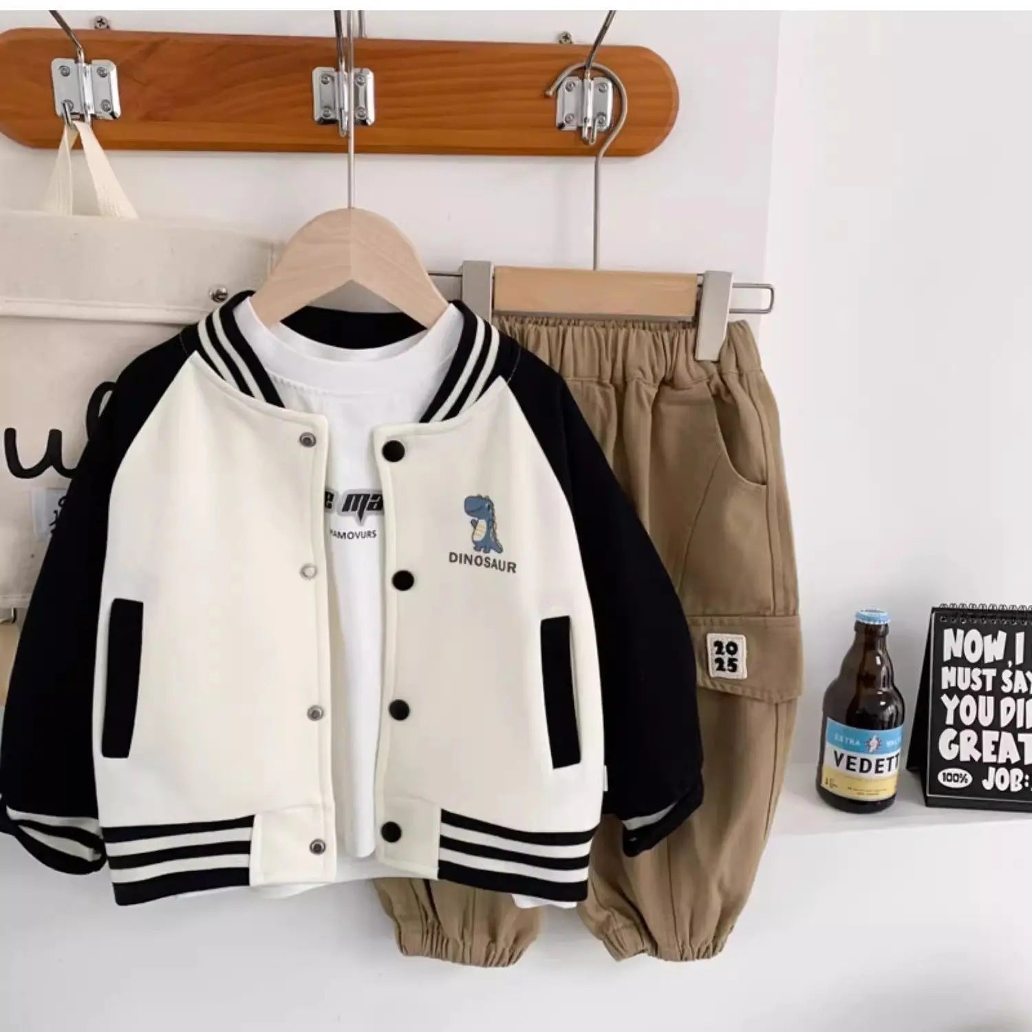 Gear up your little roarsome dinosaur for autumn adventures with this Toddler Boys Baseball Jacket! 