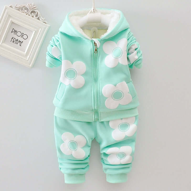 Let her explore the outdoors in style wearing this adorable Toddler Girls Flower Print Hooded Jacket/Pants set.