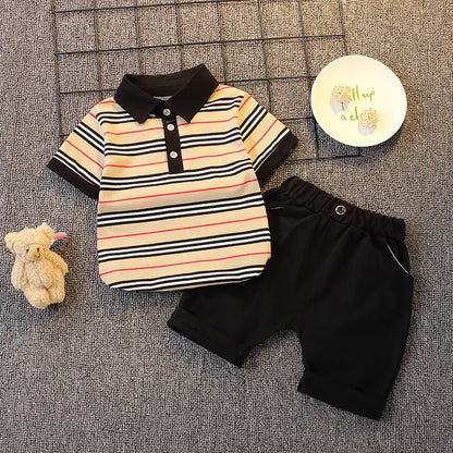 Upgrade your little one's wardrobe with our sophisticated Summer Toddler Boys Polo Shirt & Shorts 2PC Set.