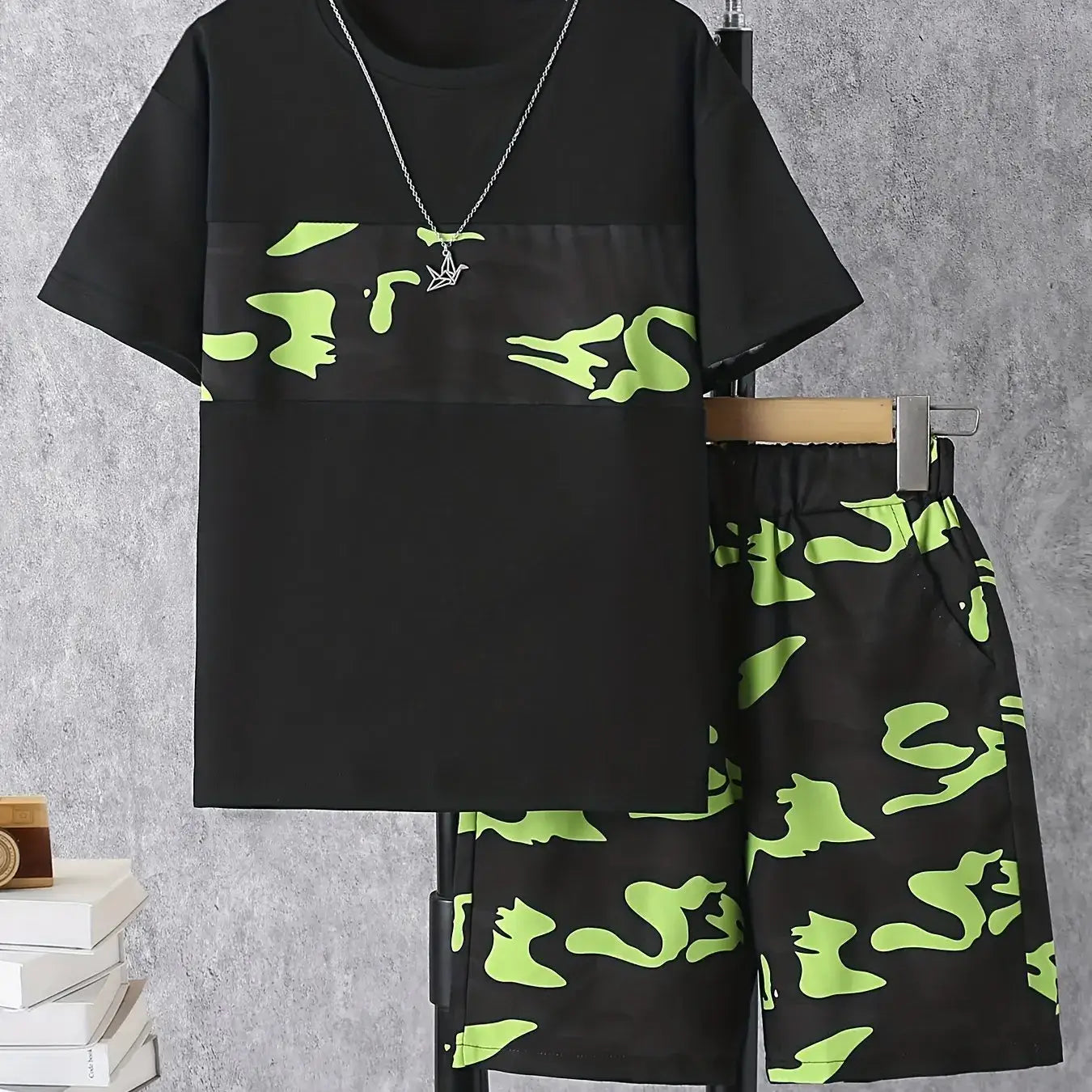 This summer, dress your little boy in the stylish and comfortable Camouflage Round Neck T-shirt and Shorts set!