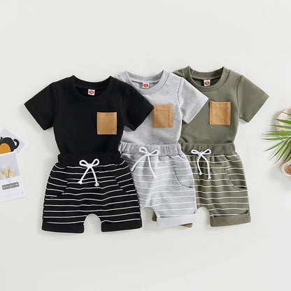 Dress your boy in style with a comfy colorblock tee and striped shorts. Perfect for summer fun, ages 6m-4y.