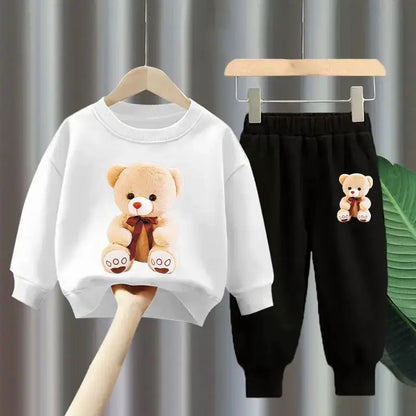 Get your little one ready for the colder months with our Winter Girls Cartoon Bear Printed Sweatshirt & Pants set!