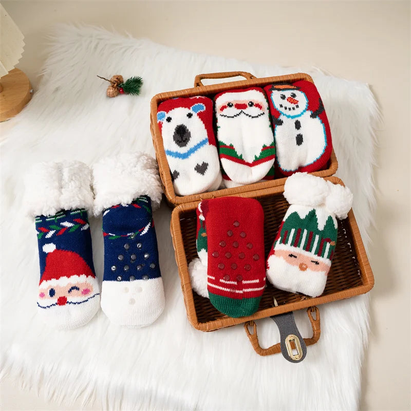 Stay cozy this holiday season with our Winter Kids Cartoon Cotton Thermal Non-Slip Christmas Socks!