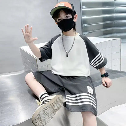 Elevate your little boy's back to school style with our casual contrast striped T-shirt and shorts set.