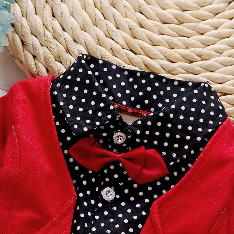 Dress your toddler to impress with this stylish long-sleeve, button-up shirt with bow tie and matched pants!