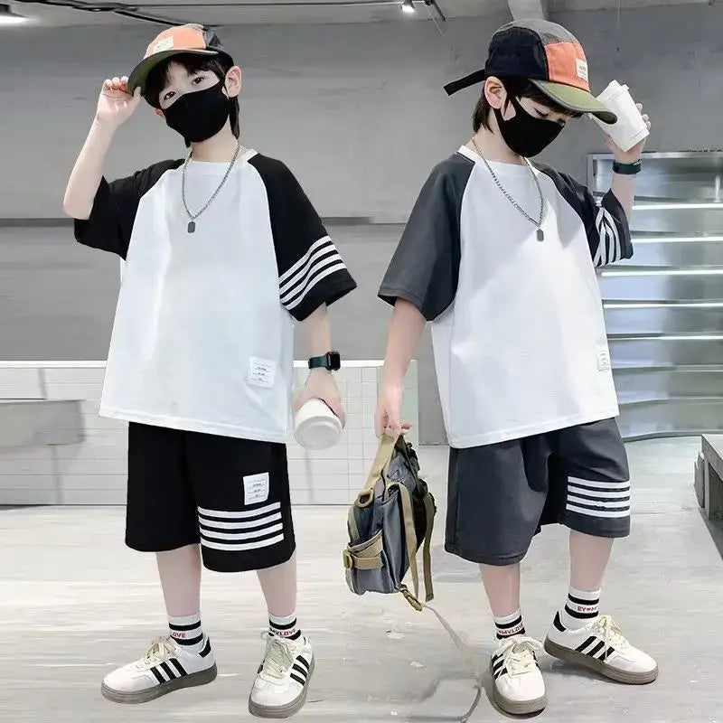 Elevate your little boy's back to school style with our casual contrast striped T-shirt and shorts set.