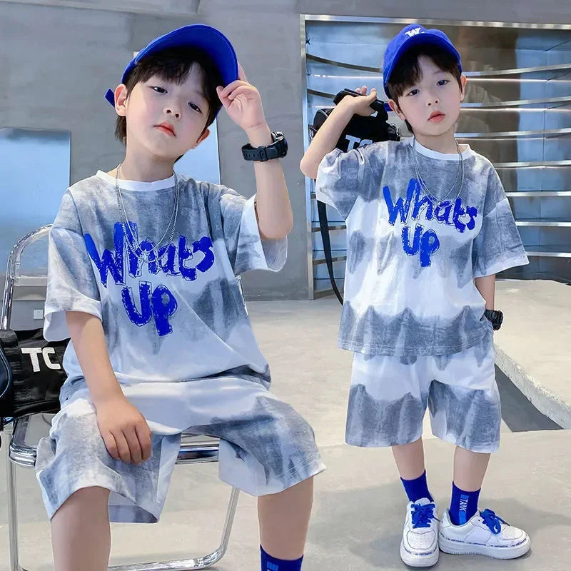 Introducing the Summer Boys Quick dry WHATS UP T-Shirt and Shorts set! Perfect for stylish boys who want to make a statement this summer.