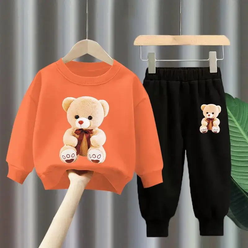 Get your little one ready for the colder months with our Winter Girls Cartoon Bear Printed Sweatshirt & Pants set!