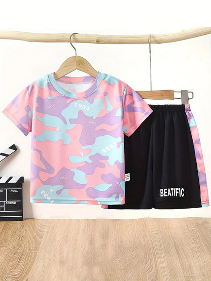 Let your little dude stay cool and stylish this summer with our Camo T-Shirt and Shorts set.