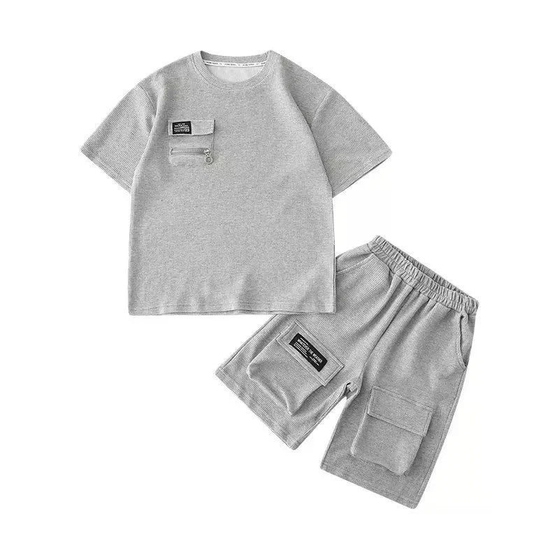 Get your little boy ready for back to school with our Boys Back To School Big Pocket Shorts and Matching T-Shirt set!