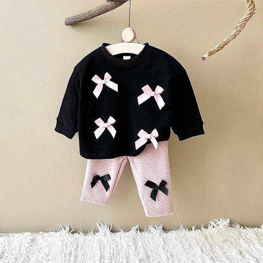 Get your little fashionista ready for spring with this stylish Bow Top and pants set.