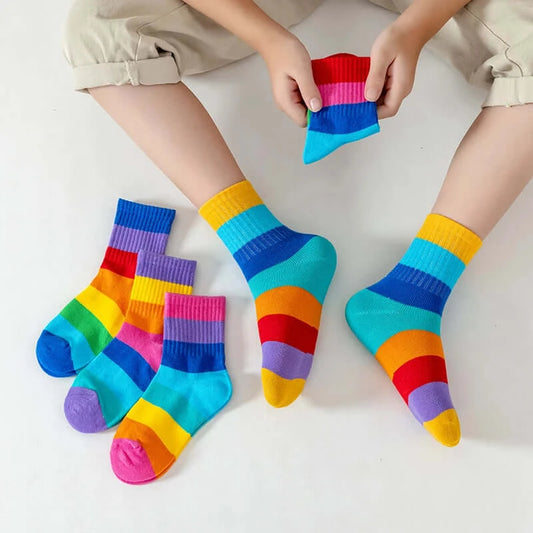 Introduce your little ones to colorful fun with our Kids Fun Rainbow 7 Color Stripes Tube Socks 5PK!