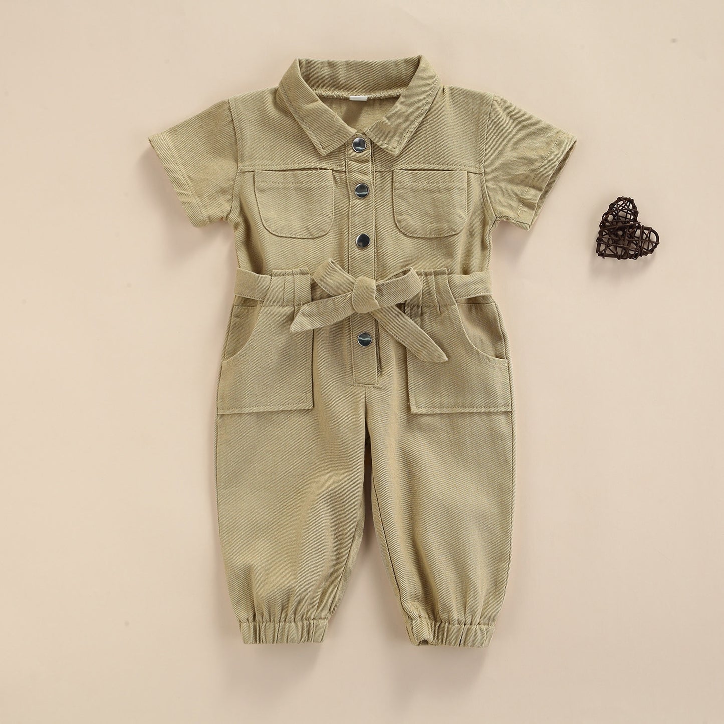 The short sleeves and jumpsuit design provide a classic fit so you can feel confident wherever you go.