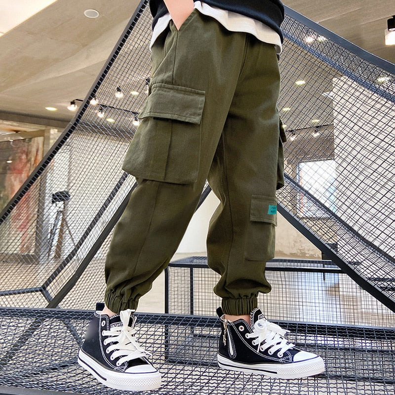 Get your boys ready these stylish and comfortable cargo pants! Made with a breathable polyester material.