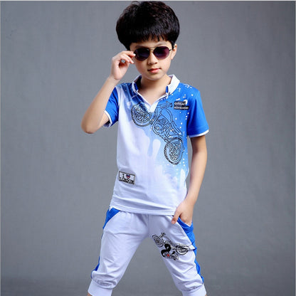 Your boy will look stylish and chic in this boys Action Print Short Sleeve Shirt and Shorts set.