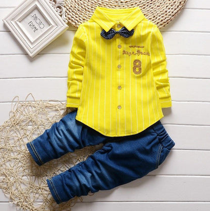 Dress your toddler to impress with this stylish long-sleeve, button-up shirt with bow tie and matched pants!