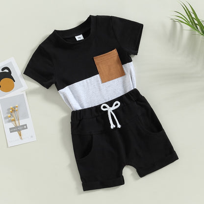 This set includes a contrasting top with short sleeves and solid shorts sure to make your toddler stand out in a crowd.